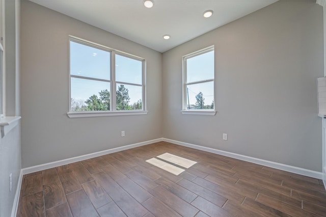 248 Alleda, Prairie View, TX 77484 - unfurnished room featuring dark wood-style flooring and recessed lighting