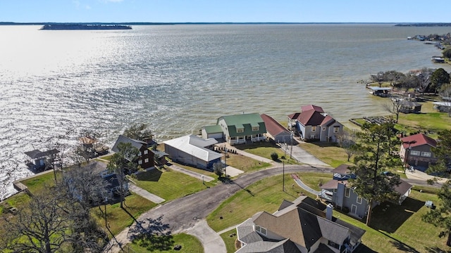 aerial view with a water view and a residential view