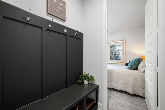 mudroom featuring carpet