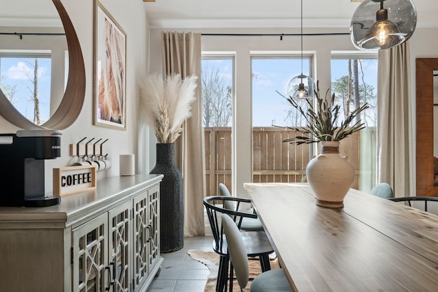 dining space with light wood-style flooring