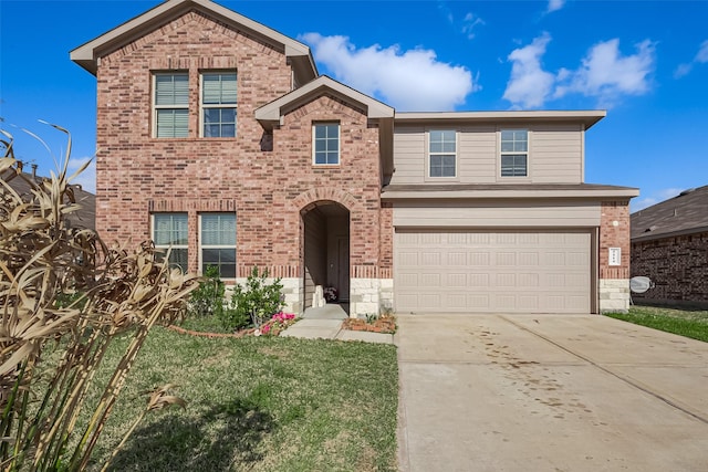 traditional-style house featuring brick siding, an attached garage, and concrete driveway