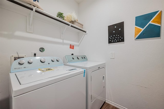 clothes washing area featuring laundry area and independent washer and dryer