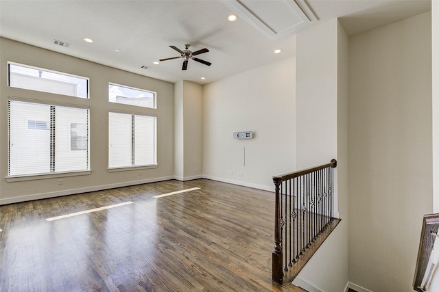 interior space featuring visible vents, recessed lighting, attic access, and wood finished floors