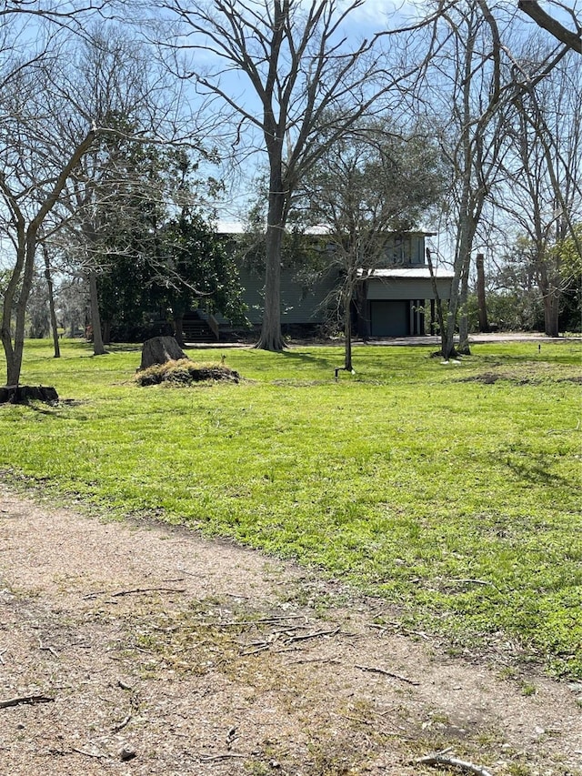 view of yard featuring an attached garage