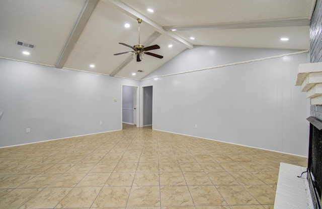 unfurnished living room featuring ceiling fan, lofted ceiling with beams, a brick fireplace, and visible vents