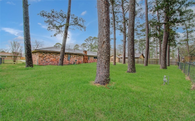 view of yard featuring fence