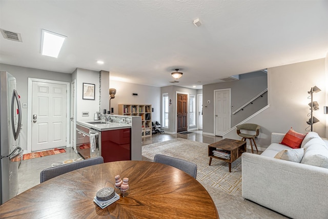 dining area with baseboards and visible vents