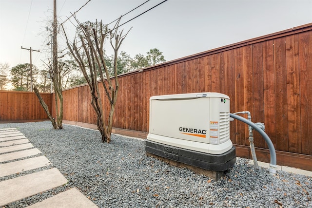 details featuring a power unit and fence