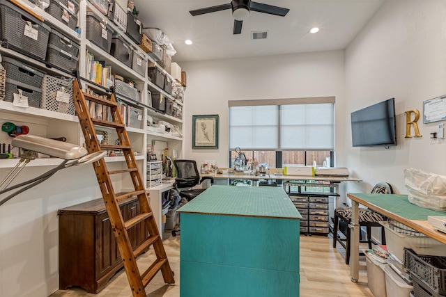 office space featuring recessed lighting, visible vents, wood finished floors, and a ceiling fan