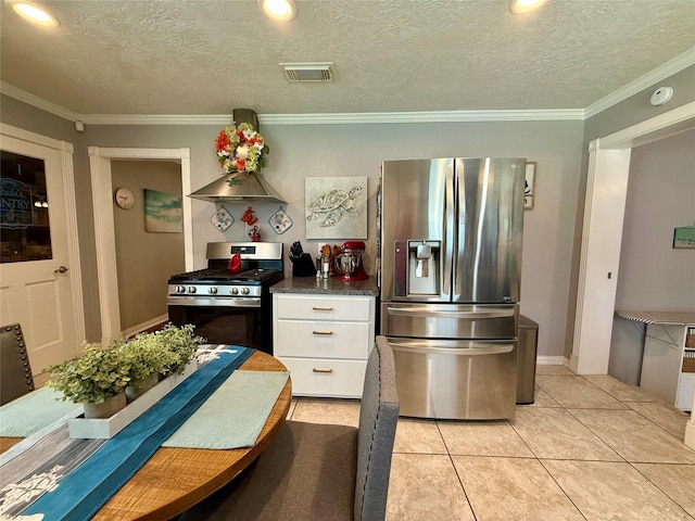 kitchen with visible vents, white cabinetry, ornamental molding, appliances with stainless steel finishes, and wall chimney exhaust hood