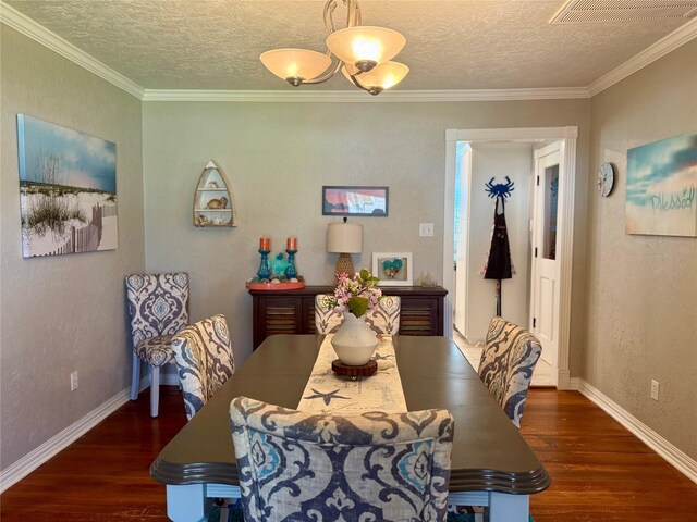 dining space featuring a textured ceiling, a textured wall, wood finished floors, visible vents, and baseboards