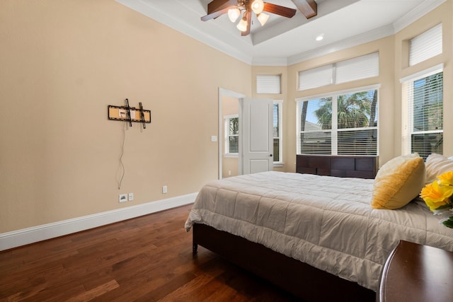 bedroom with dark wood-style floors, ornamental molding, recessed lighting, and baseboards