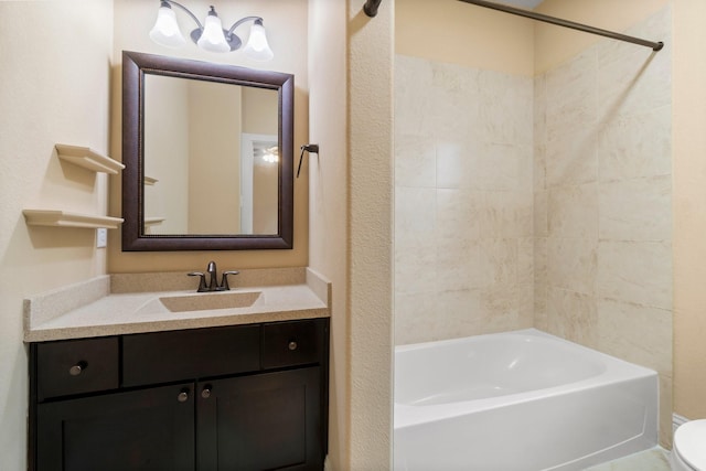 full bathroom featuring toilet, shower / washtub combination, and vanity