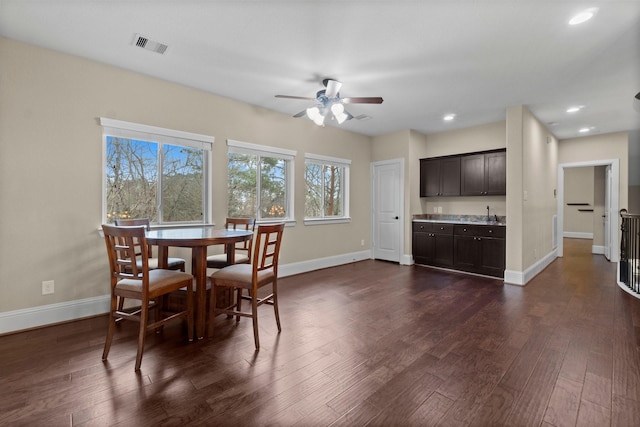 dining space featuring ceiling fan, dark wood-style flooring, recessed lighting, and baseboards