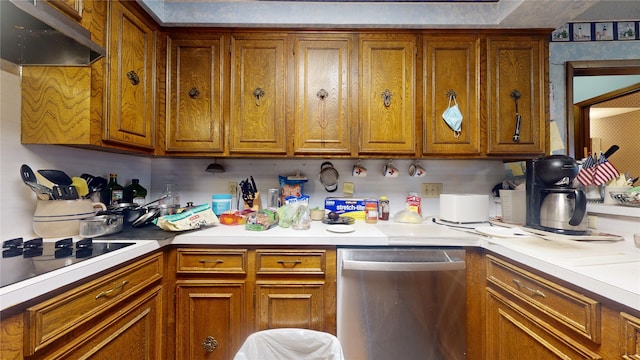 kitchen with stainless steel dishwasher, brown cabinetry, and under cabinet range hood