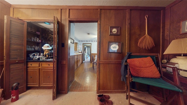 hallway with wooden walls