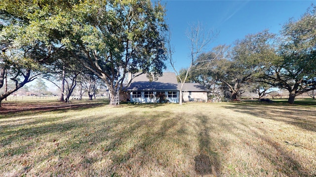 view of front of home with a front lawn