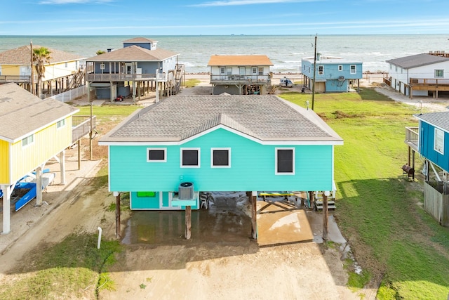 bird's eye view featuring a water view and a residential view