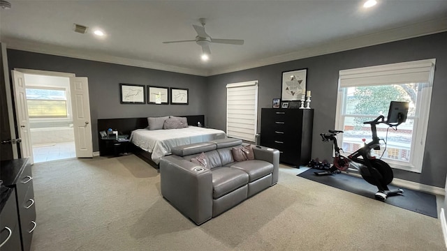 bedroom with visible vents, ornamental molding, baseboards, and light colored carpet