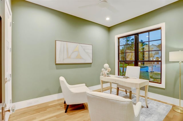 home office featuring a ceiling fan, recessed lighting, baseboards, and wood finished floors