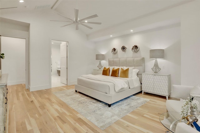 bedroom featuring light wood-type flooring, lofted ceiling with beams, baseboards, and recessed lighting