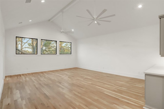 unfurnished room with light wood-style floors, beam ceiling, baseboards, and a ceiling fan