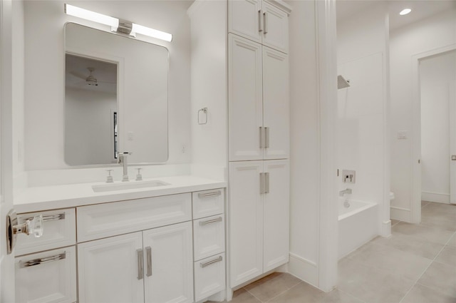 bathroom featuring shower / bath combination, tile patterned flooring, and vanity