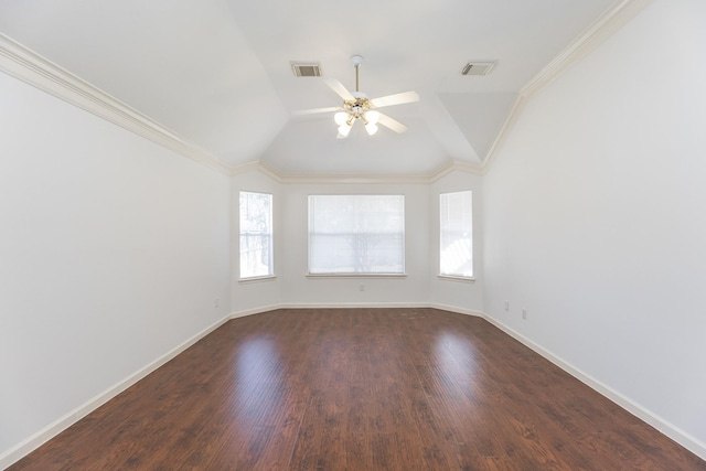 empty room featuring dark wood-type flooring, visible vents, and plenty of natural light