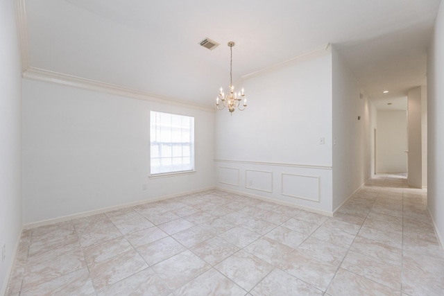 spare room featuring visible vents, wainscoting, crown molding, a decorative wall, and a notable chandelier