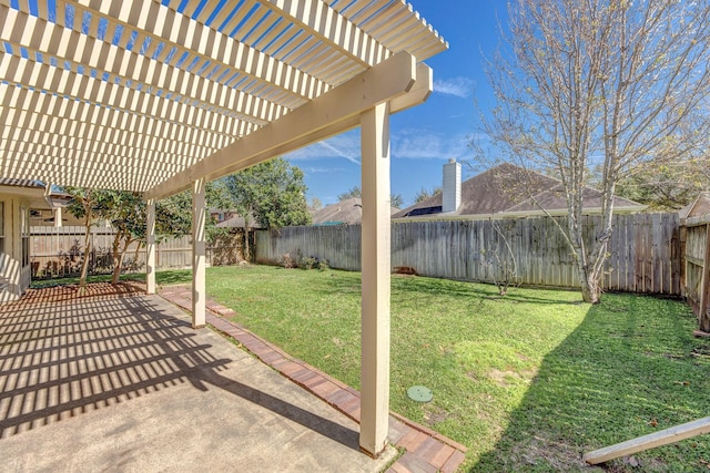 view of yard with a patio area, a fenced backyard, and a pergola