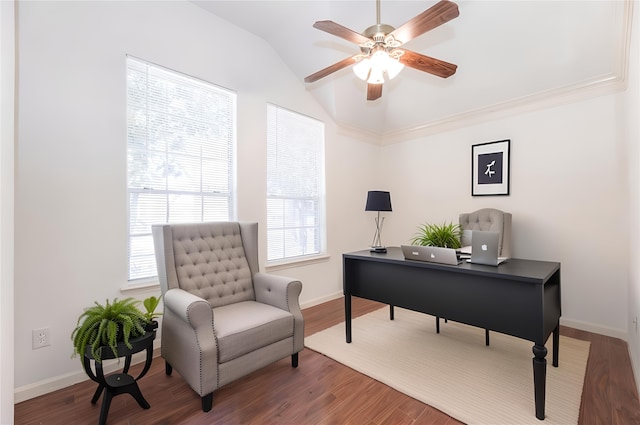 office area featuring lofted ceiling, wood finished floors, a wealth of natural light, and baseboards