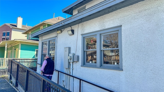 view of home's exterior with stucco siding