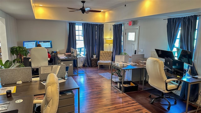 office space with a ceiling fan and wood finished floors