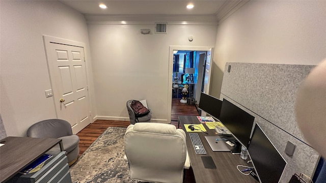 office space featuring ornamental molding, wood finished floors, visible vents, and recessed lighting