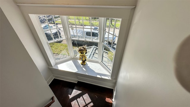 details with wood finished floors and baseboards