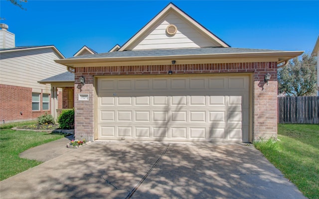 view of front of home featuring concrete driveway, brick siding, and fence