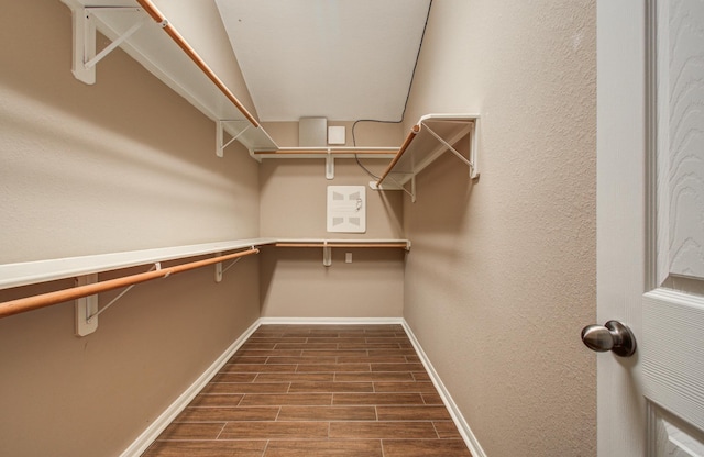 spacious closet featuring wood tiled floor