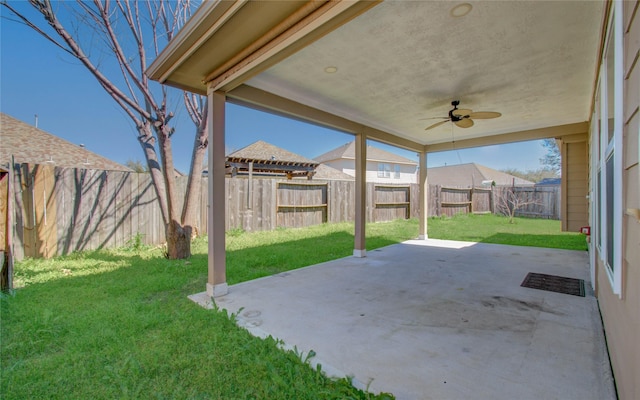 view of patio / terrace featuring ceiling fan and a fenced backyard