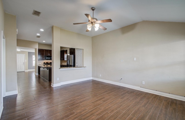 unfurnished living room with ceiling fan, dark wood-style flooring, vaulted ceiling, and visible vents