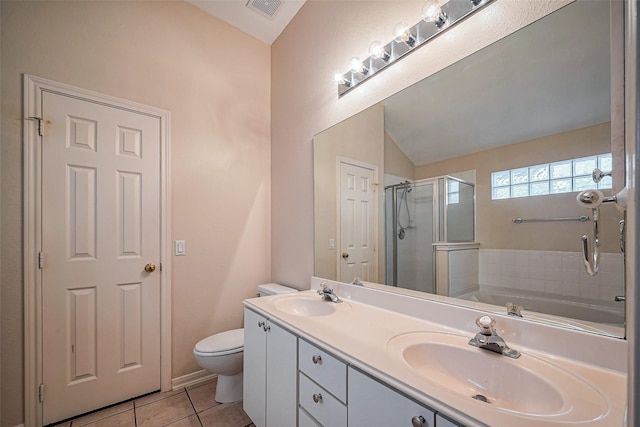 bathroom featuring a shower stall, visible vents, tile patterned floors, and a sink