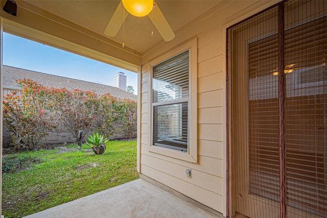 view of patio featuring a ceiling fan