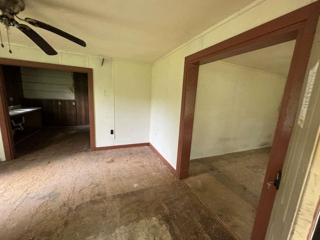 spare room with ceiling fan