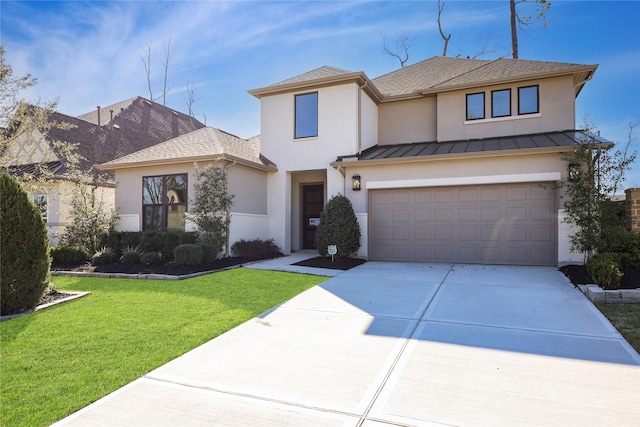 view of front of property with a standing seam roof, stucco siding, a front lawn, concrete driveway, and metal roof