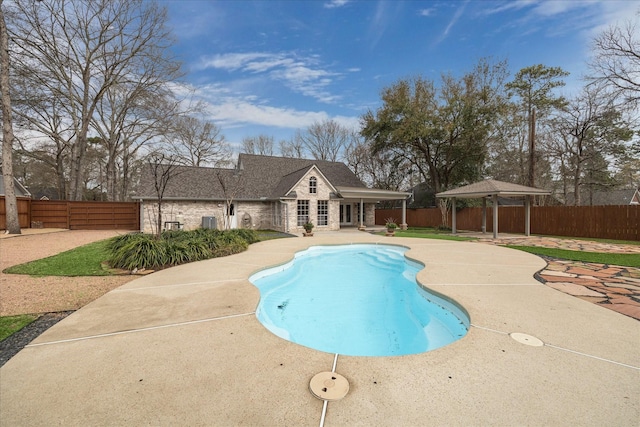 view of swimming pool with a fenced backyard, a gazebo, a patio, and a fenced in pool