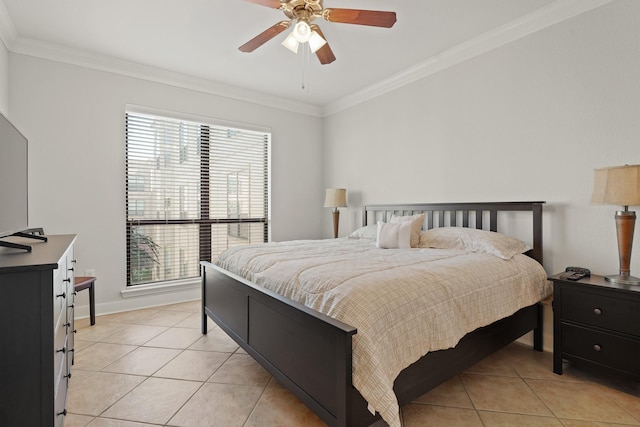 bedroom featuring light tile patterned floors, ceiling fan, ornamental molding, and baseboards