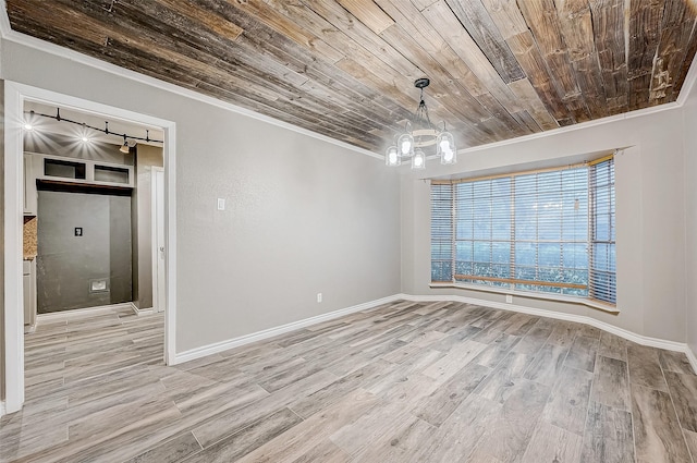 empty room with baseboards, wooden ceiling, light wood-style flooring, ornamental molding, and a chandelier