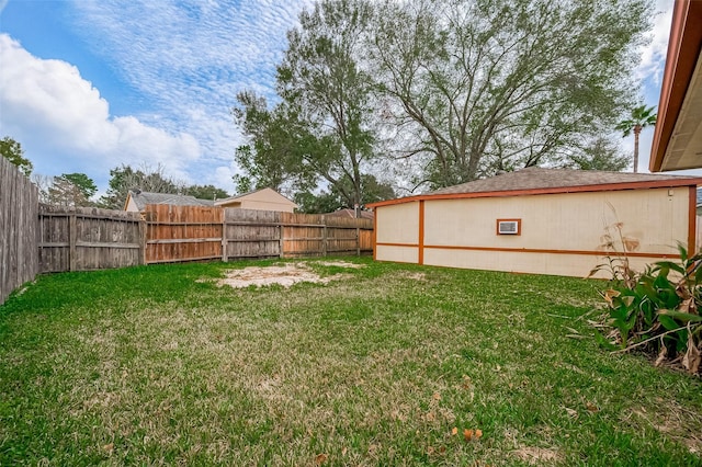 view of yard with a fenced backyard