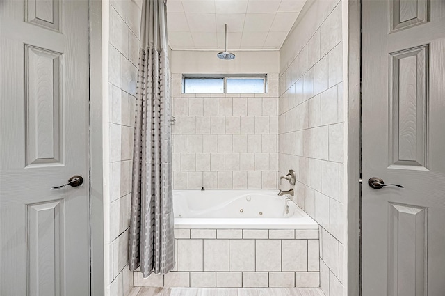 full bath featuring a combined bath / shower with jetted tub