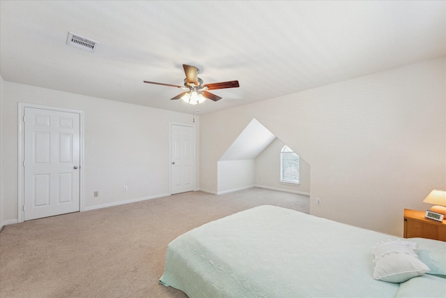 bedroom featuring carpet floors, visible vents, baseboards, and a ceiling fan