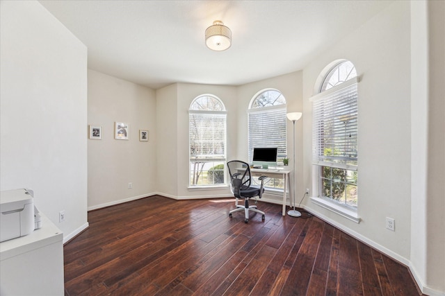 home office featuring wood-type flooring and baseboards